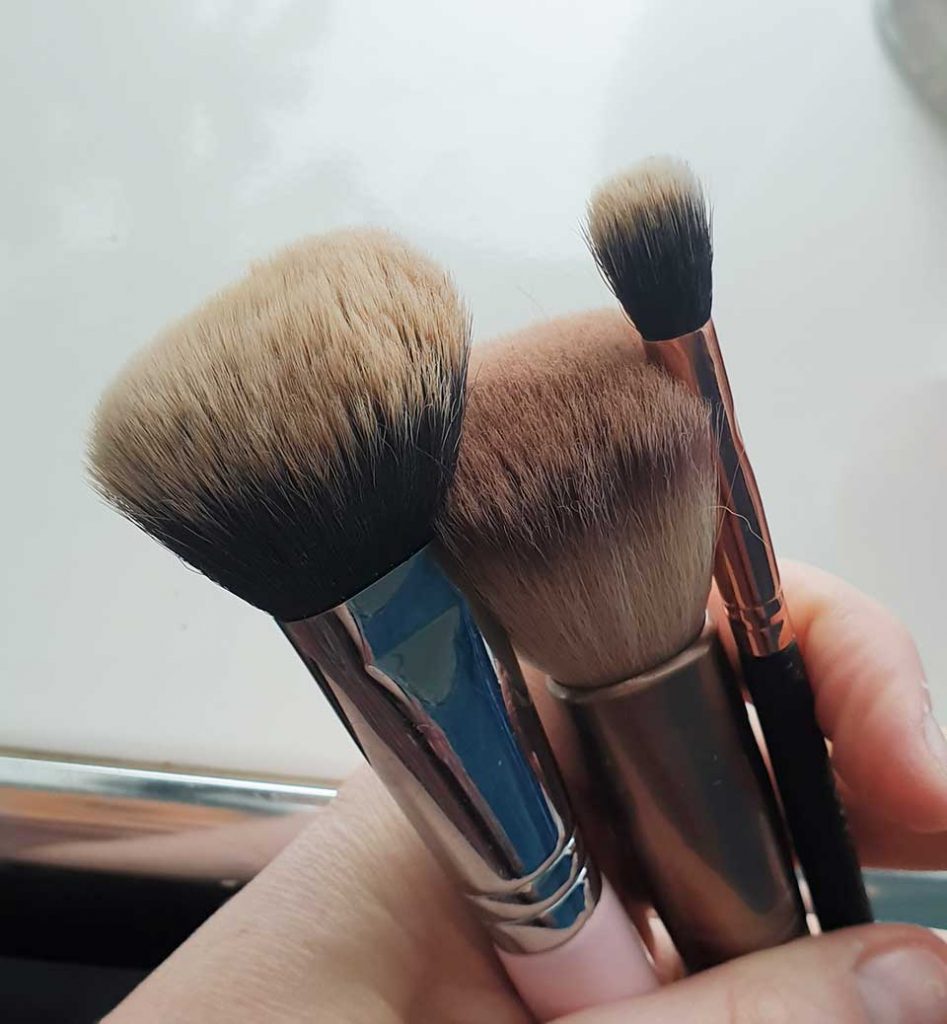 ISOCLEAN Makeup Brush Cleaner - 3 dirty brushes ready for cleaning